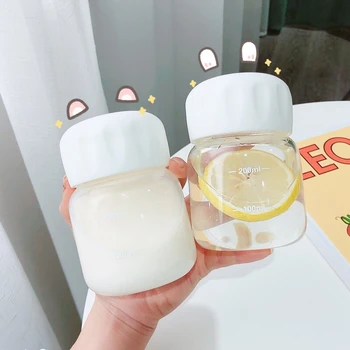 200 ml su şişesi Mini cam su şişeleri taşınabilir sevimli ısıya dayanıklı su bardağı yaratıcı basit fincan kolu küçük süt kupası